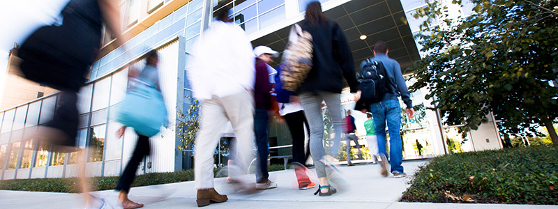 students walking into the medical education technology building on UNT Health's campus
