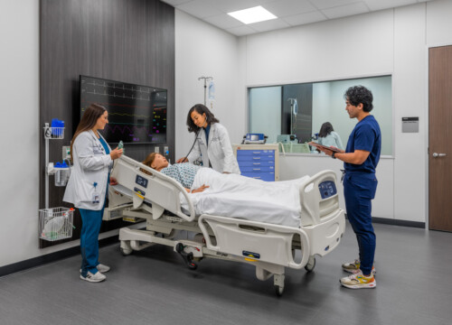 Medical students in an acute care room