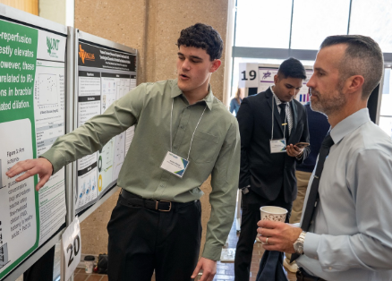 Ayrion Moody presents research at Student Research Spotlight event