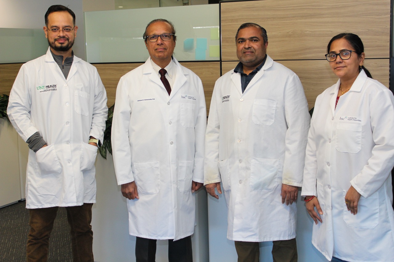 Group of scientist in white lab coats