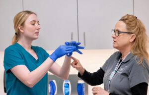 An instructor advises a student