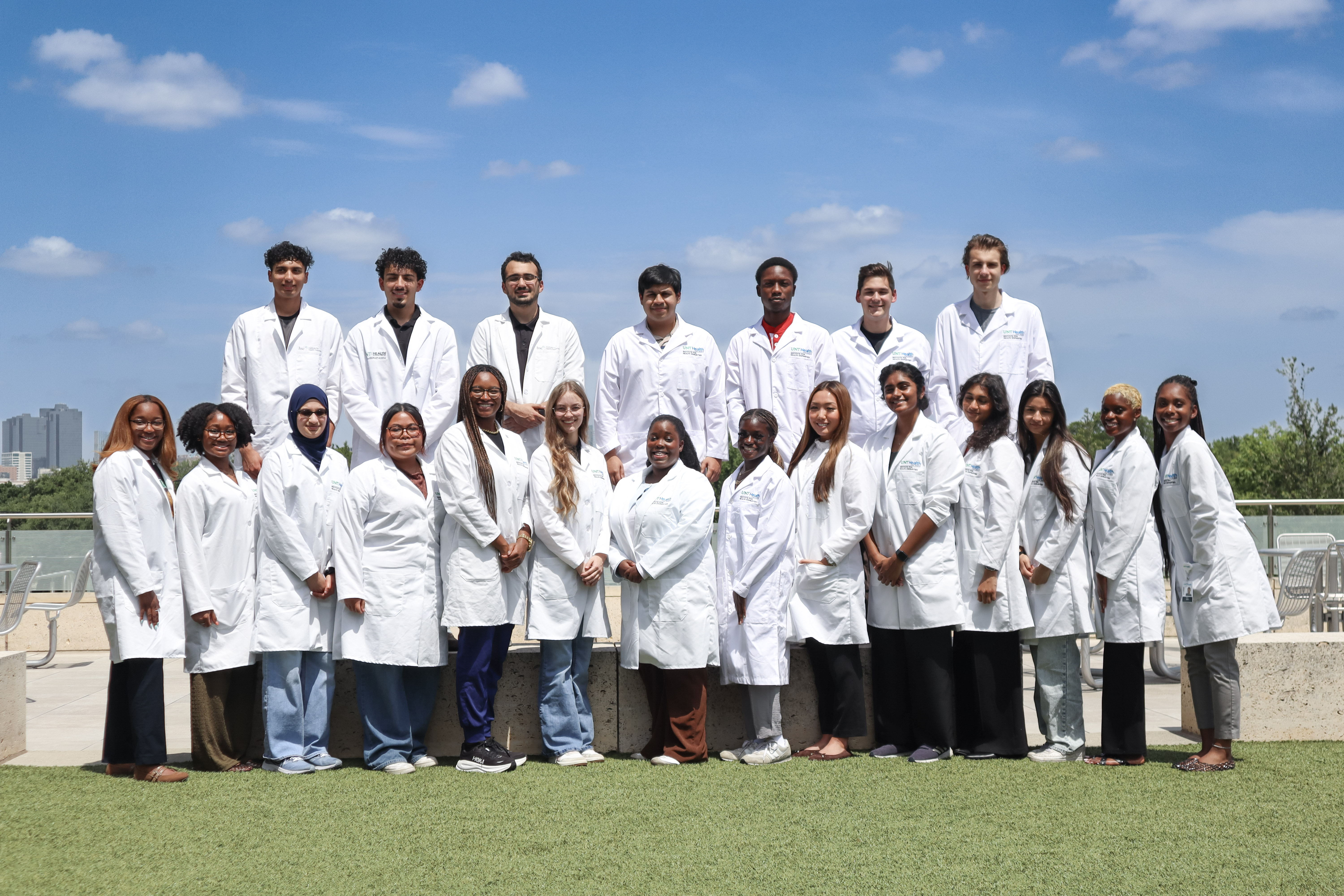 group of students wearing their white coats
