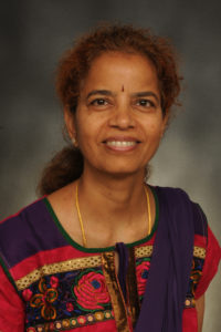 Dr. Usha Sambamoorthi headshot with gray background