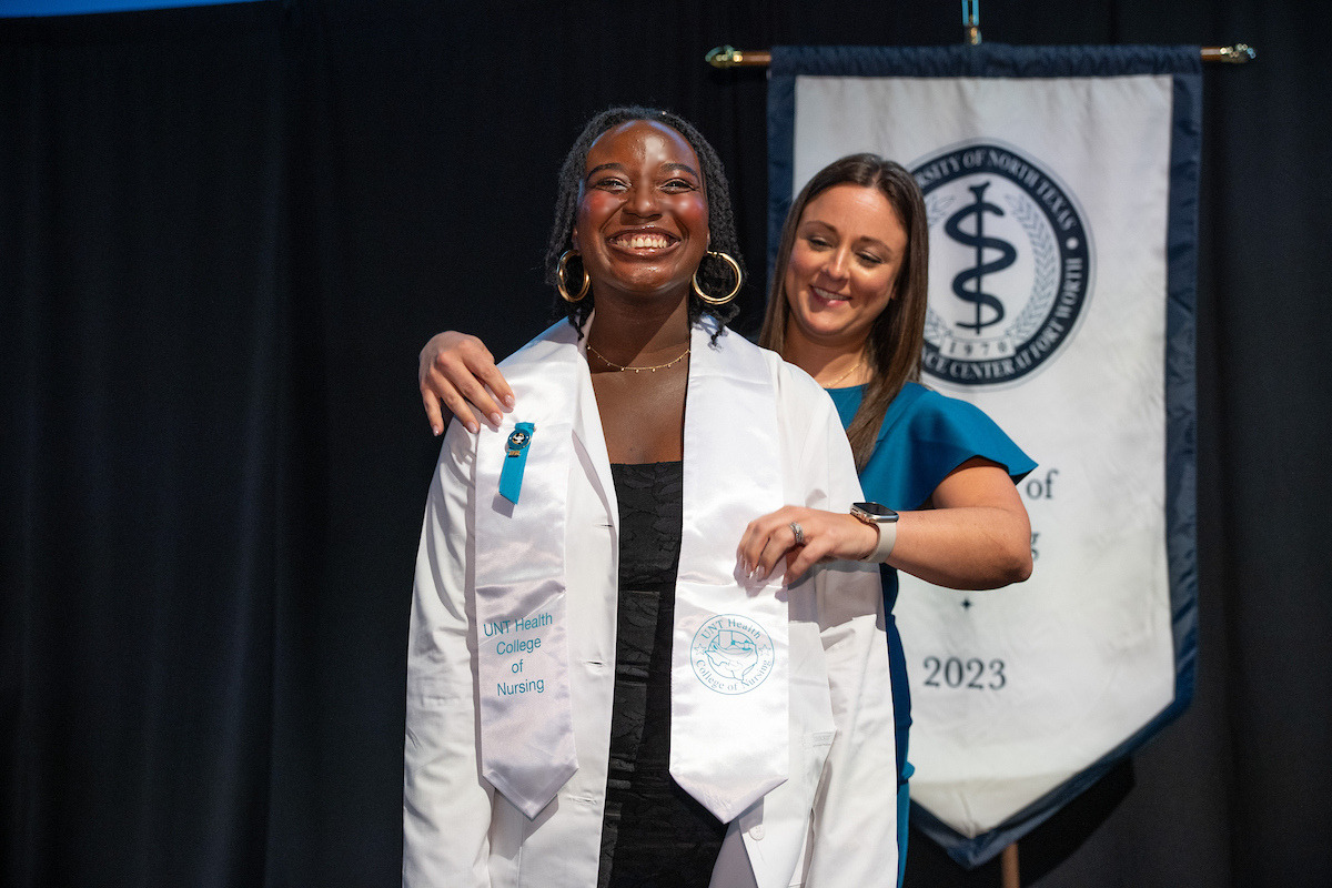 Momo Akindele receiving her pin