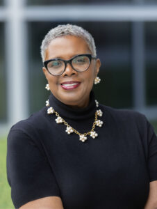 A profile picture of Desiree Ramirez looking directly at the camera with a warm smile.