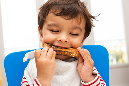 Child eating toast