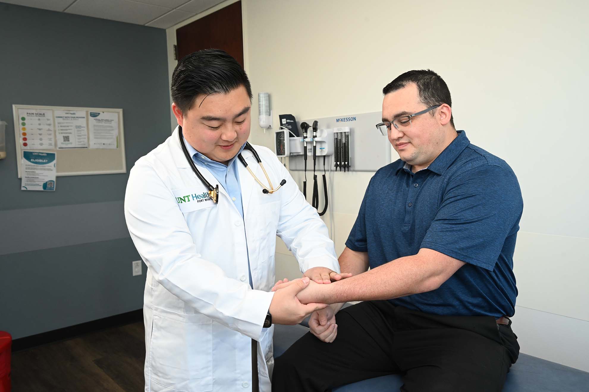 Dr. Patrick Feng with Patient