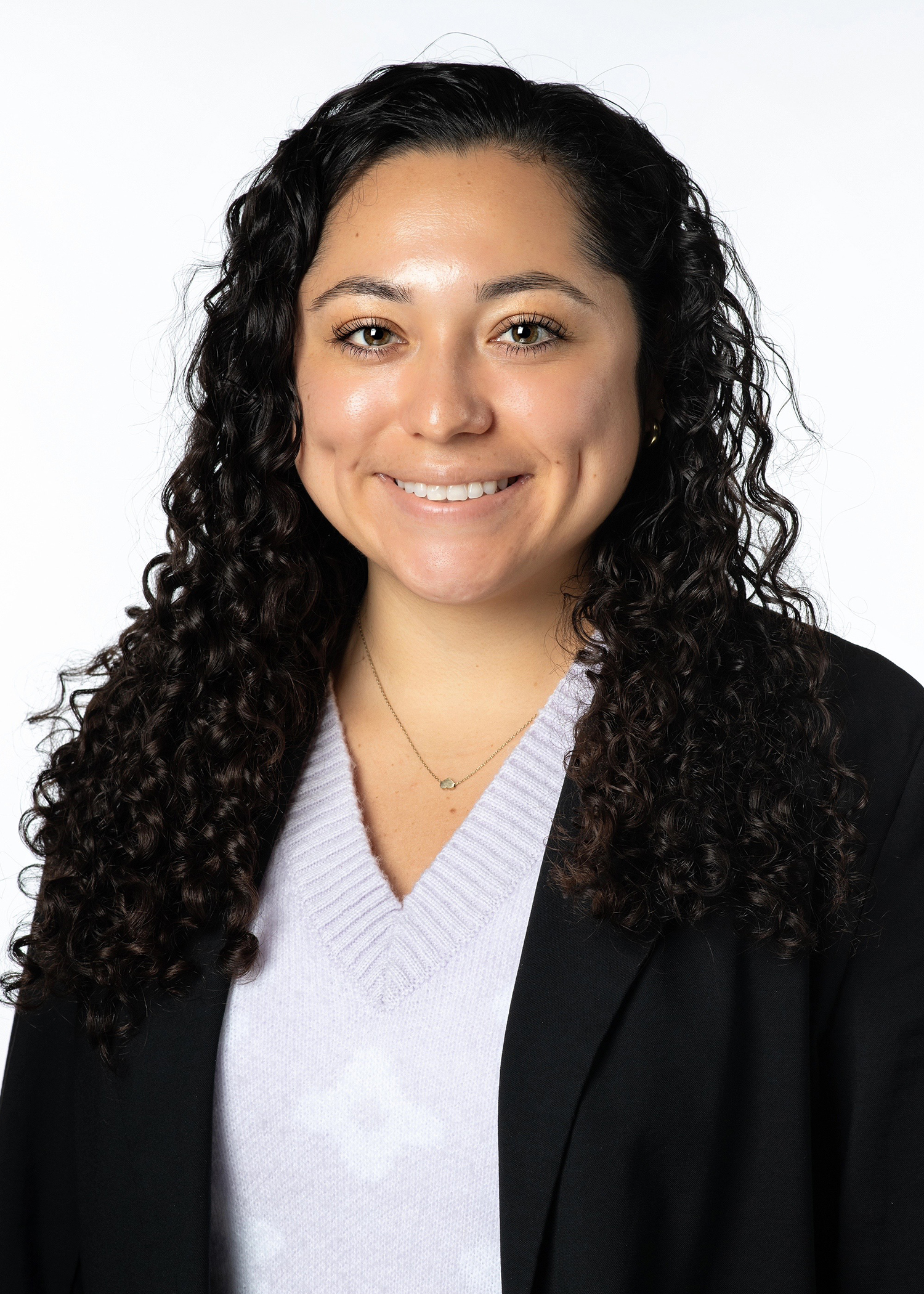 Madison Mondragon headshot wearing a black blazer