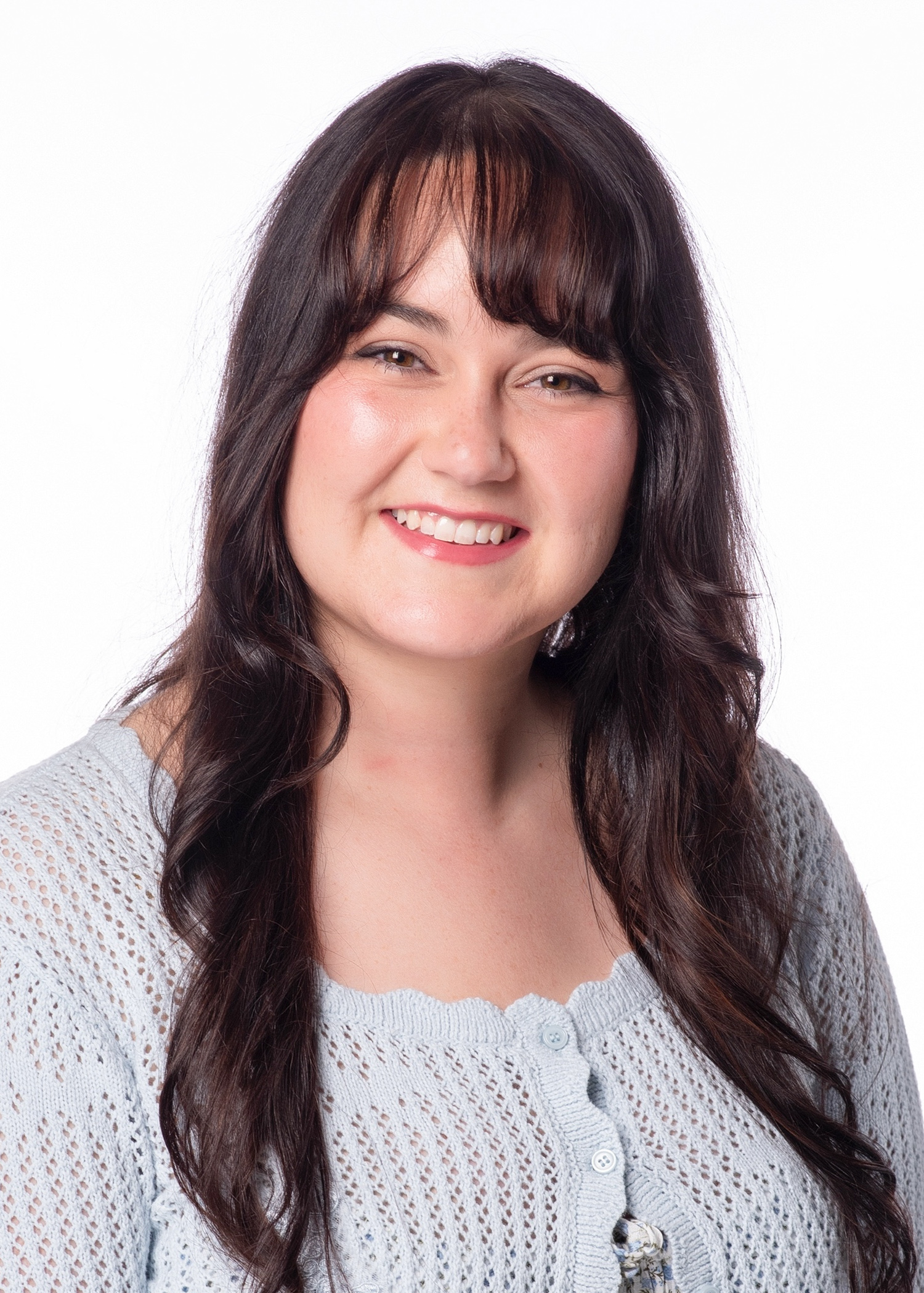 Tiffany Gardner headshot wearing a white blouse